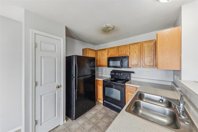 kitchen featuring black appliances and sink