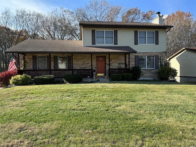 front of property featuring covered porch and a front yard