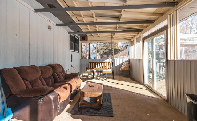 sunroom / solarium with lofted ceiling