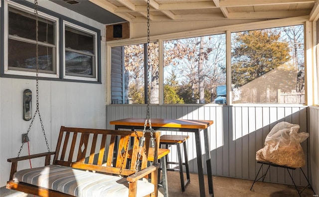 sunroom with lofted ceiling