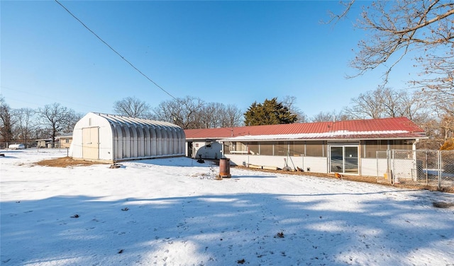 view of snow covered property