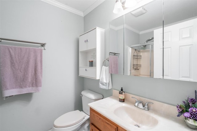 bathroom featuring vanity, toilet, ornamental molding, and walk in shower