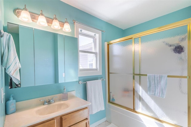 full bath featuring shower / bath combination with glass door and vanity