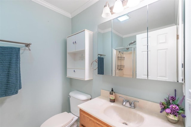 bathroom featuring toilet, ornamental molding, and vanity