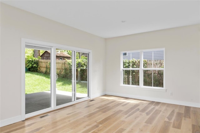 empty room featuring light hardwood / wood-style floors