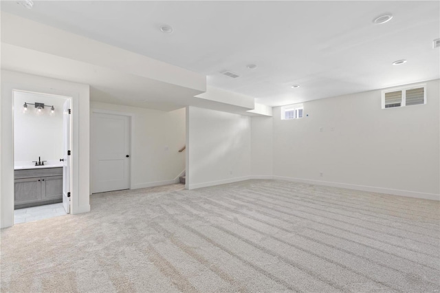 basement with light carpet