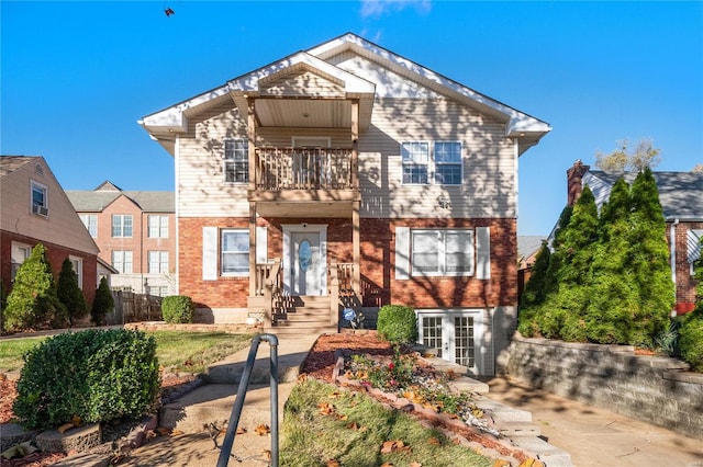 front of property featuring a balcony