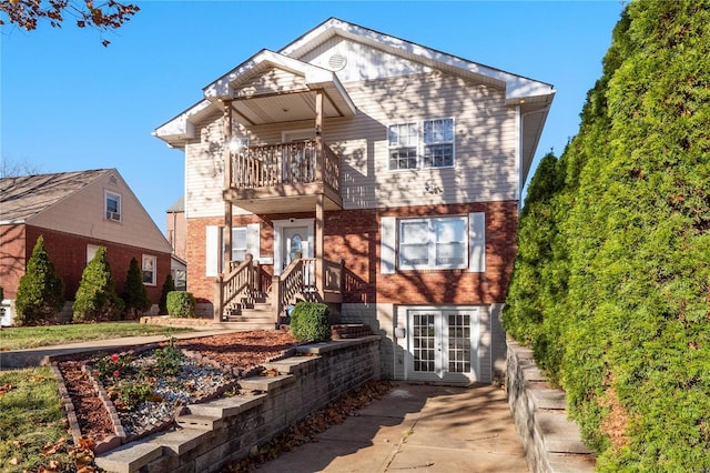 front of property featuring a balcony