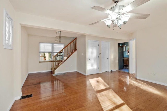 interior space featuring ceiling fan and hardwood / wood-style flooring