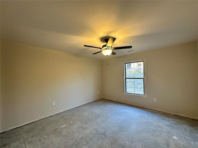 unfurnished room with concrete floors