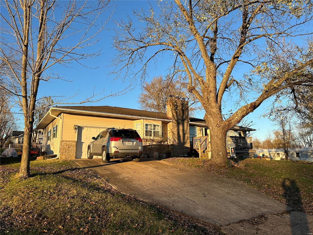 single story home with a garage