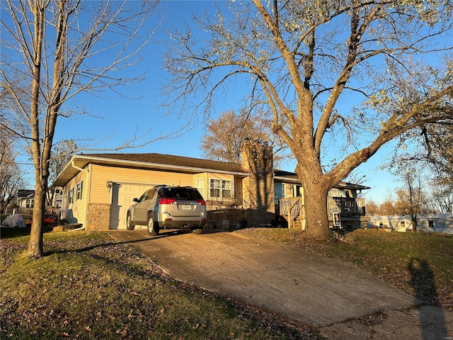 single story home with a garage