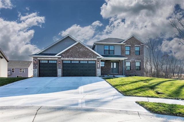 craftsman house featuring a garage and a front lawn