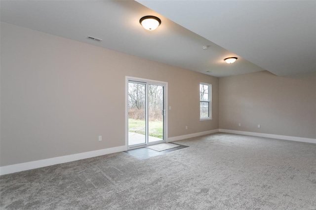 unfurnished room with carpet floors