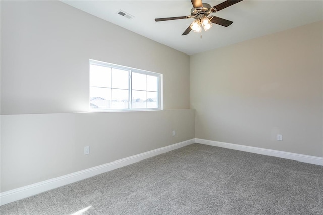 unfurnished room featuring ceiling fan and carpet flooring