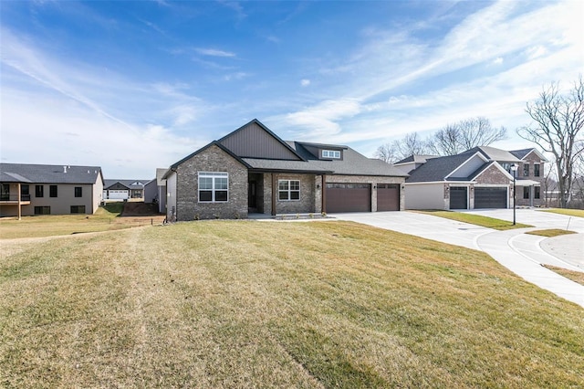 view of front of house featuring a garage and a front yard