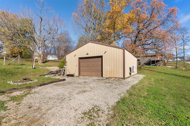 garage with a yard