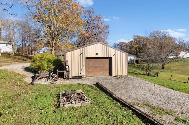 garage with a lawn