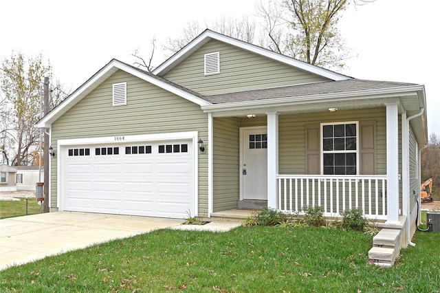 view of front facade featuring a front yard, a porch, central AC, and a garage