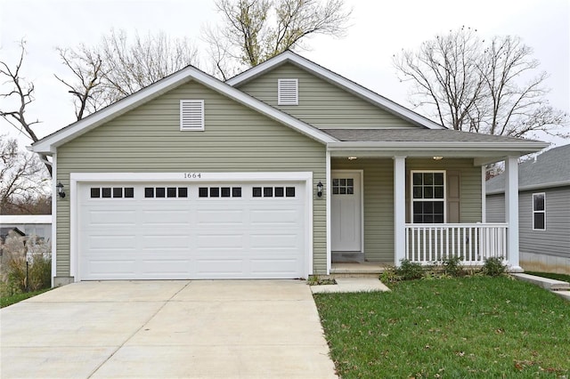 view of front facade with covered porch and a garage