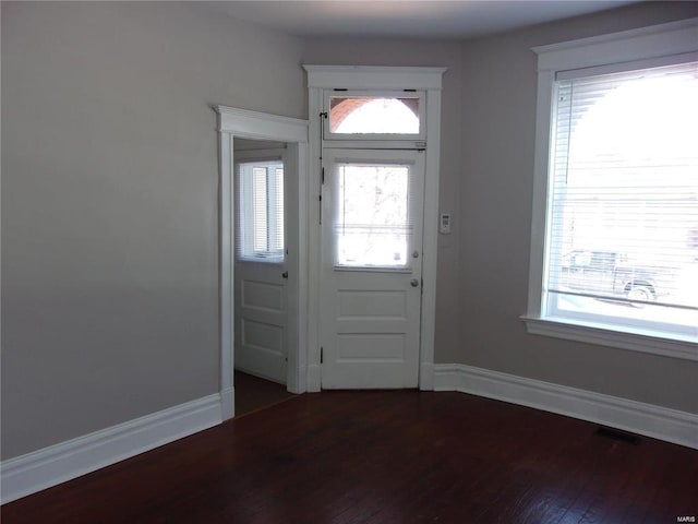 entrance foyer with hardwood / wood-style floors