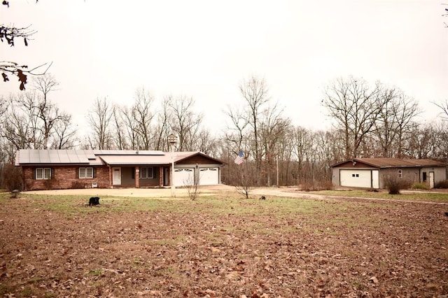 view of yard with a garage