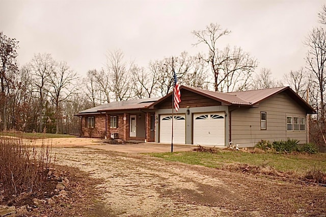 single story home with a garage