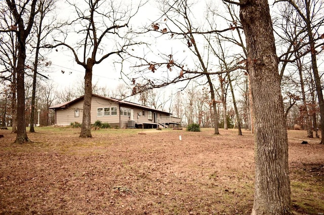 view of yard with central AC unit