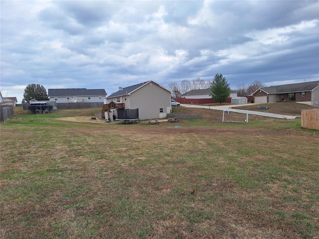 view of yard featuring a trampoline