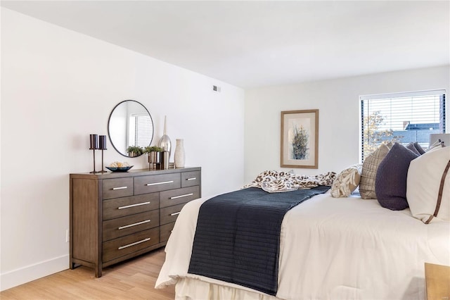 bedroom featuring light hardwood / wood-style floors