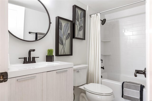 full bathroom featuring shower / bath combination with curtain, vanity, and toilet