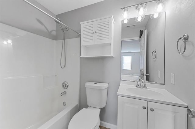 full bathroom featuring toilet, vanity, and bathing tub / shower combination