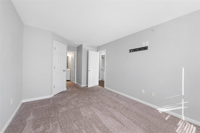 unfurnished bedroom featuring carpet flooring