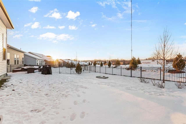 view of yard covered in snow