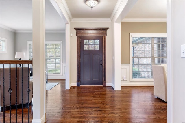 entryway featuring dark hardwood / wood-style floors and ornamental molding