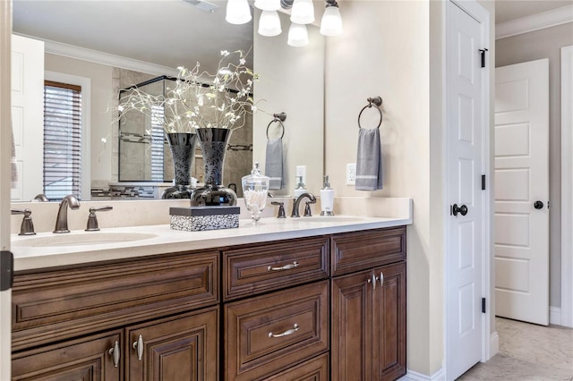 bathroom featuring vanity and ornamental molding