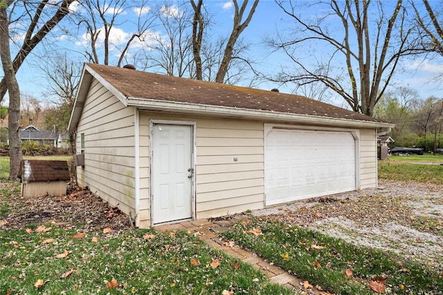 view of outbuilding featuring a garage