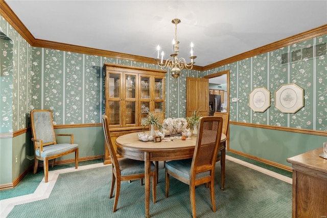 dining room with an inviting chandelier and ornamental molding