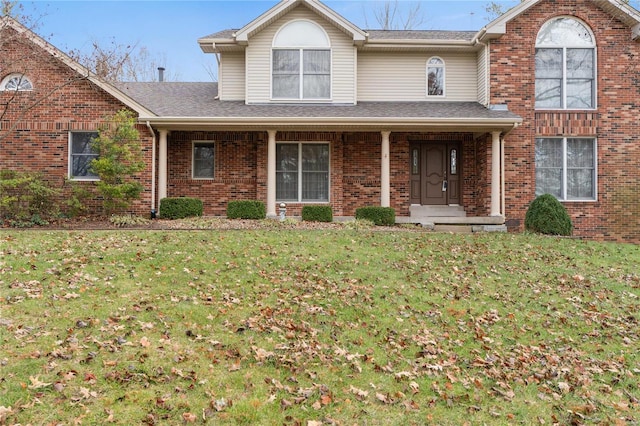 view of front property featuring a front yard