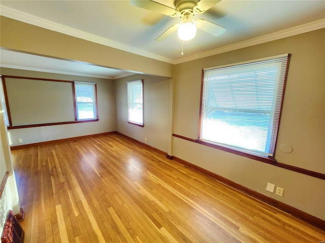 unfurnished room with light wood-type flooring, ceiling fan, and ornamental molding