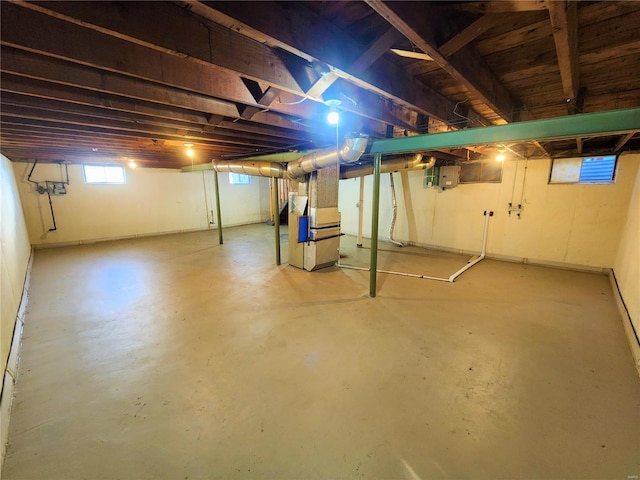 basement featuring heating unit