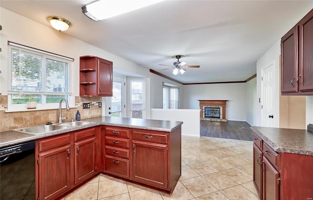 kitchen with decorative backsplash, ceiling fan, a healthy amount of sunlight, and black dishwasher