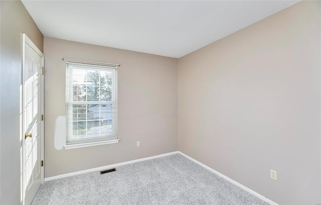 empty room with carpet floors