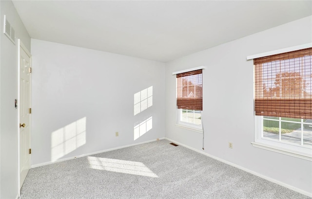 empty room with carpet flooring