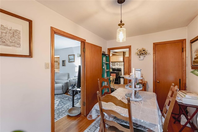 dining area featuring hardwood / wood-style flooring