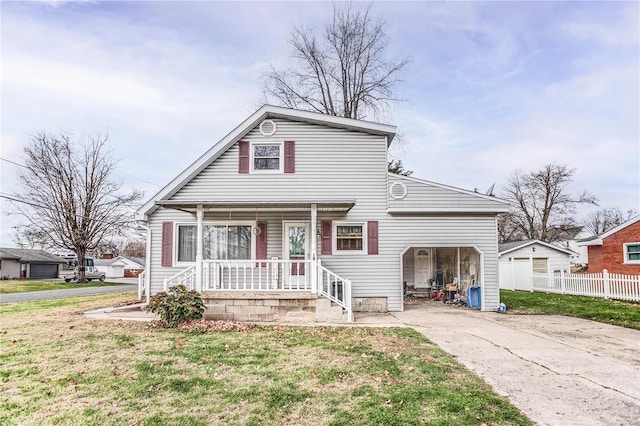 view of front of house featuring a front yard and a carport