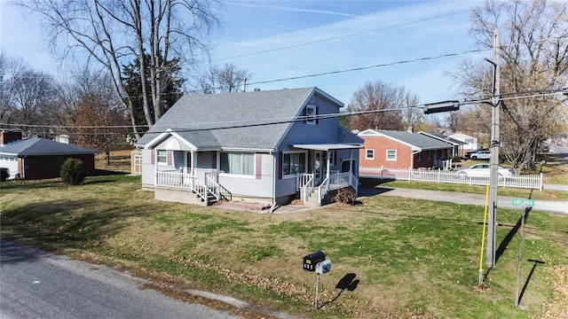 view of front of property with a front lawn