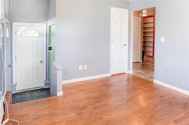 foyer with light wood-type flooring