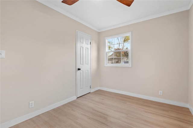 unfurnished room featuring ceiling fan, light hardwood / wood-style flooring, and ornamental molding