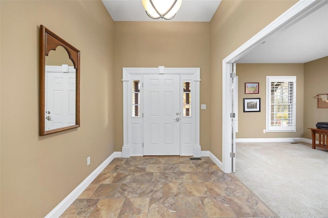 view of carpeted entryway